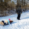Pulling Kids in the SkiPulk.com Snowclipper Pulk Sled